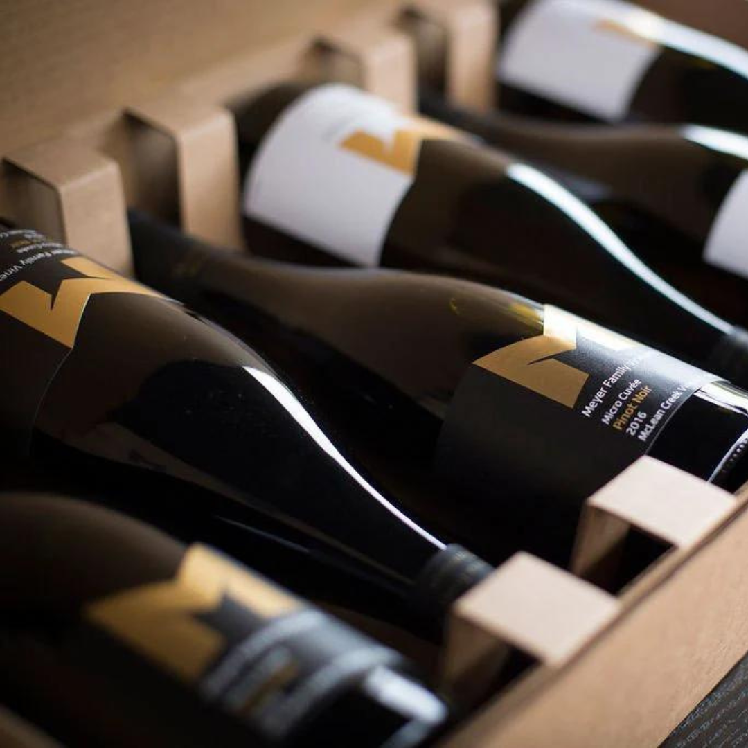 Meyer Family Vineyards Pinot Noirs and Chardonnay bottles in a box